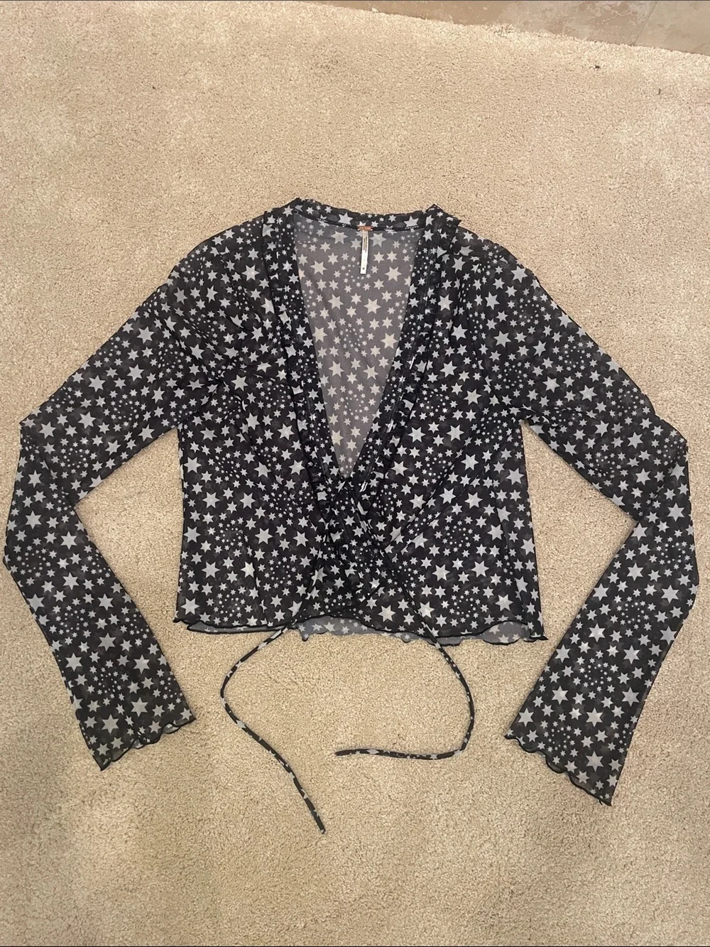 Free People sheer longsleeve black with white stars wrap top, size M